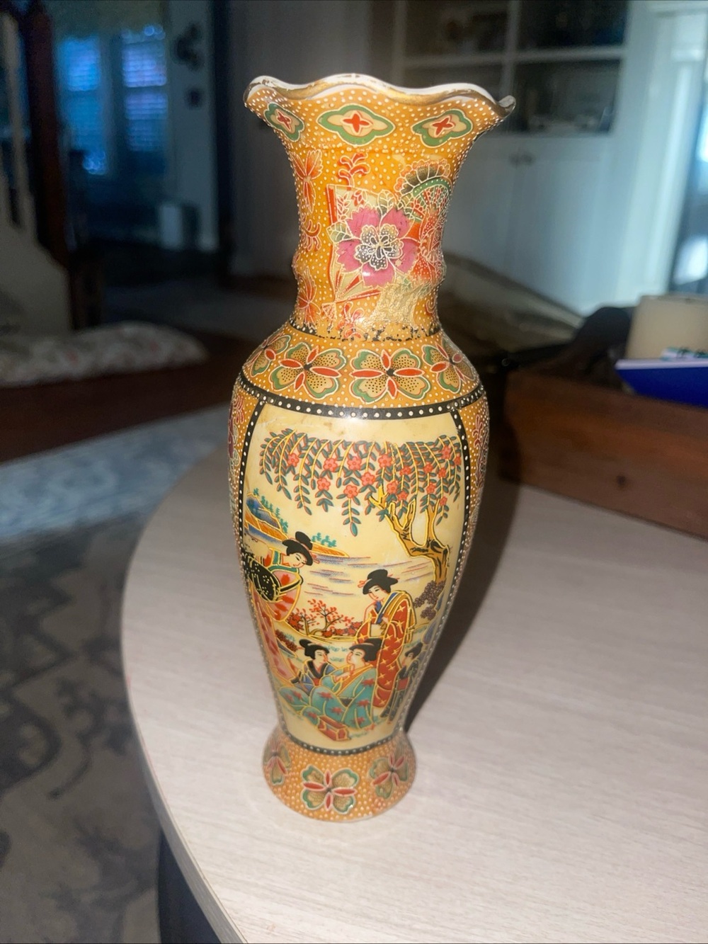Porcelain vase with hand-painted geisha garden scene in Satsuma style